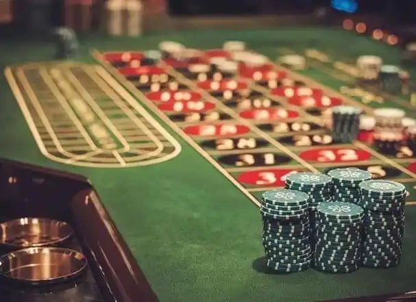 Baccarat with traditional and side-bet play Baccarat table with side-bet options displayed